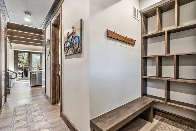 a view of a hallway with workspace