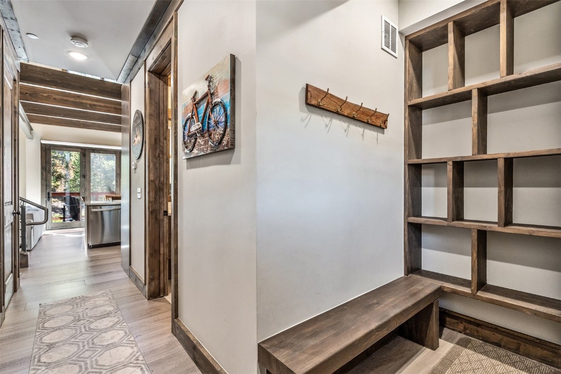 102 Lake Ridge Circle, Unit 1892 Keystone, CO 80435 - Photo 26 of 32 a view of a hallway with workspace