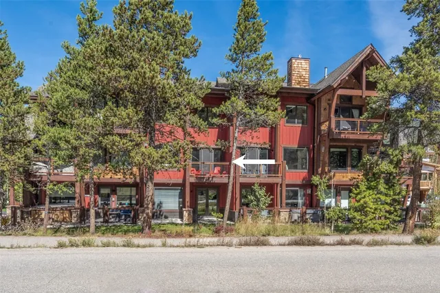 a view of a building with sitting area