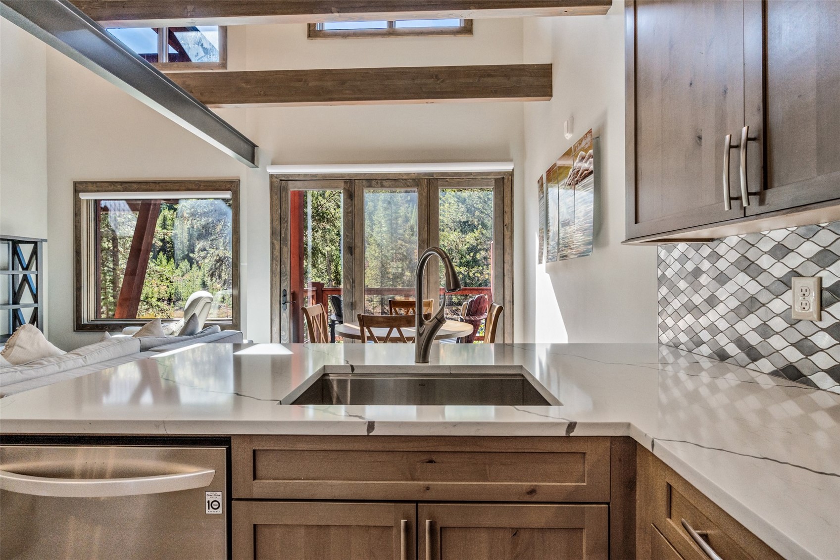 102 Lake Ridge Circle, Unit 1892 Keystone, CO 80435 - Photo 9 of 32 a kitchen with a sink and large window