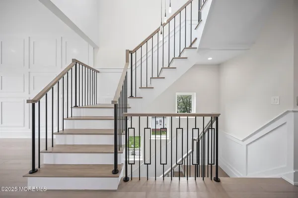 a view of entryway with wooden floor