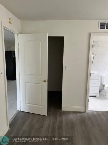 a view of a bedroom with closet