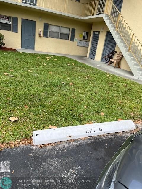1401 Northwest 45th Street, Unit 4 Deerfield Beach, FL 33064 - Photo 23 of 24 a view of outdoor space and yard