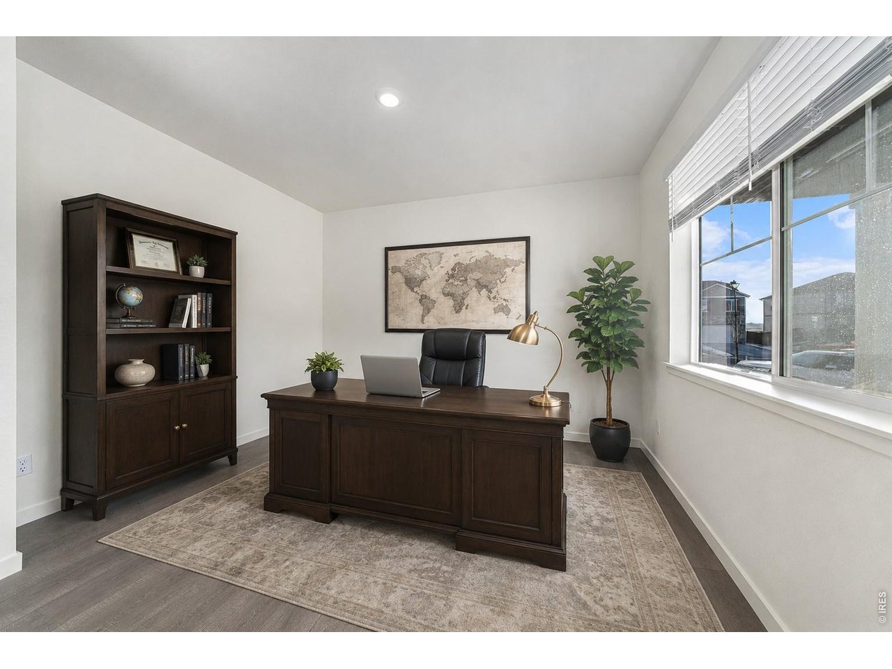 439 Bluebird Road Johnstown, CO 80534 - Photo 5 of 36 a living room with furniture and a window