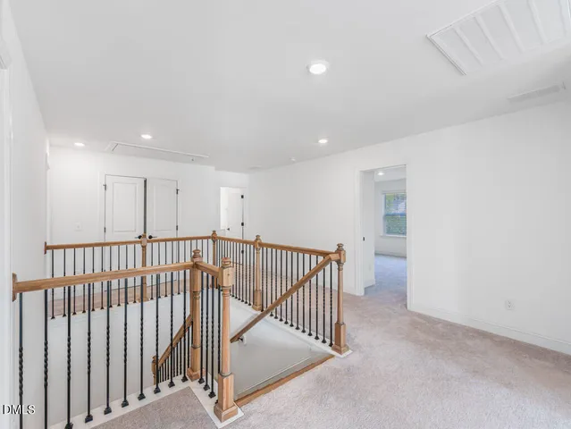 a view of a livingroom with furniture and windows