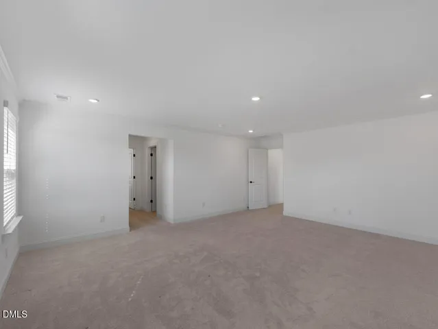 an empty room with a natural light