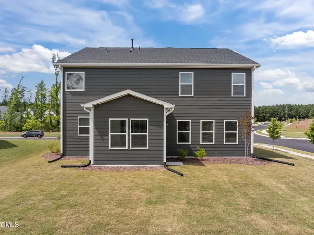 swimming pool view with a outdoor seating space