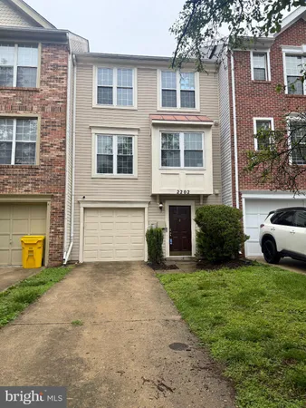 a view of a house with couches in front of house