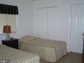 5 Watertown Road Ocean Pines, MD 21811 - Photo 2 of 10 a bedroom with a bed and a dresser