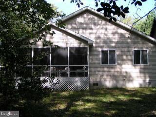5 Watertown Road Ocean Pines, MD 21811 - Photo 3 of 10 a front view of a house with a yard