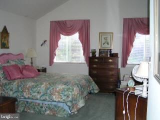 5 Watertown Road Ocean Pines, MD 21811 - Photo 7 of 10 a bedroom with a bed and a dresser