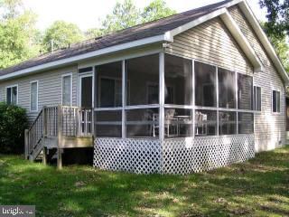 5 Watertown Road Ocean Pines, MD 21811 - Photo 10 of 10 a front view of a house with a garden