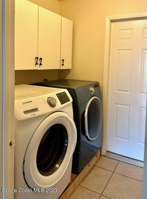 1040 Wing Road Southwest Palm Bay, FL 32908 - Photo 19 of 52 a utility room with dryer and washer