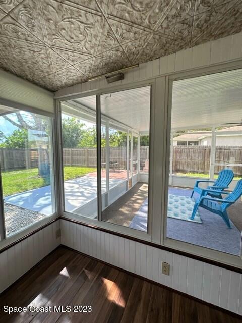 1040 Wing Road Southwest Palm Bay, FL 32908 - Photo 24 of 52 a view of a two room with wooden floor and outdoor space
