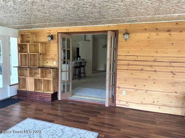 1040 Wing Road Southwest Palm Bay, FL 32908 - Photo 25 of 52 an empty room with wooden floor