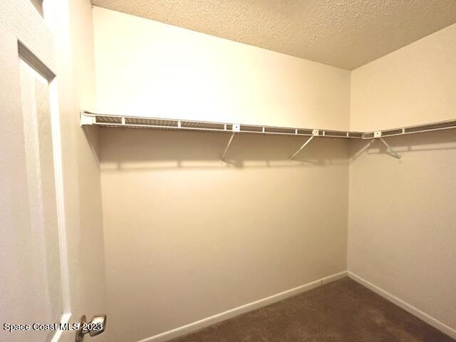 1040 Wing Road Southwest Palm Bay, FL 32908 - Photo 28 of 52 a view of a room with racks on the wall