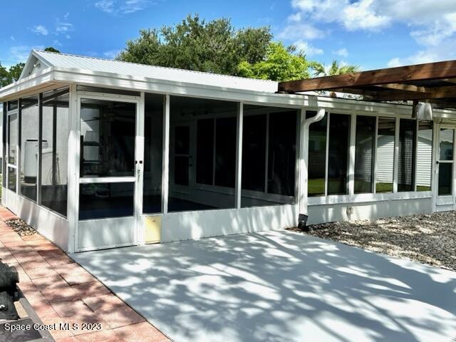 1040 Wing Road Southwest Palm Bay, FL 32908 - Photo 5 of 52 a view of house with a outdoor space