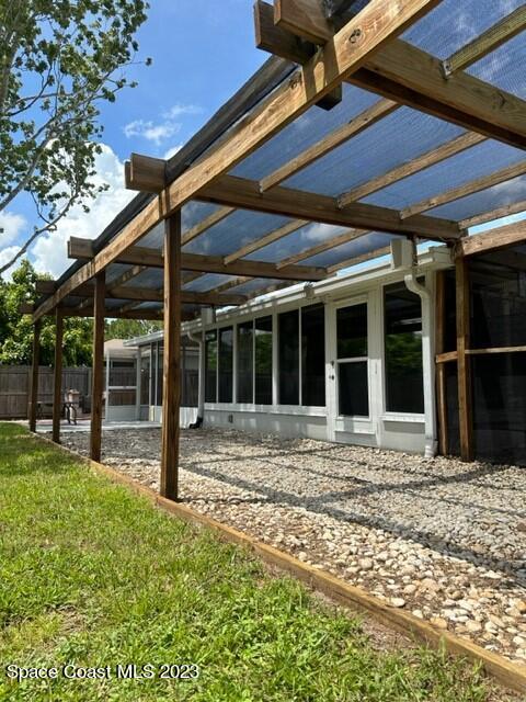 1040 Wing Road Southwest Palm Bay, FL 32908 - Photo 6 of 52 a view of a backyard with a garden
