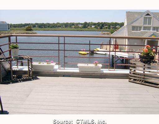 321 Popes Island Road, Unit 321 Milford, CT 06461 - Photo 1 of 1 Waterfront/Dock/Pier. View of Marina & Housatonic River