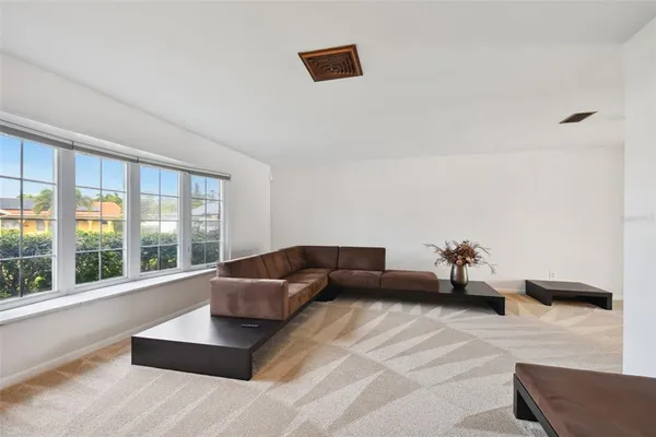 a view of a room with a large window