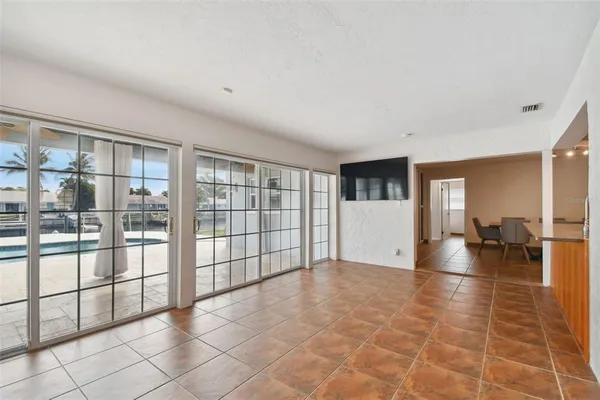 a bathroom with double vanity sinks and a mirror