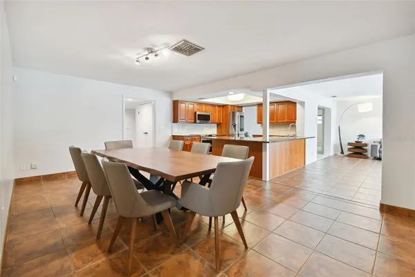 a kitchen with appliances and cabinets