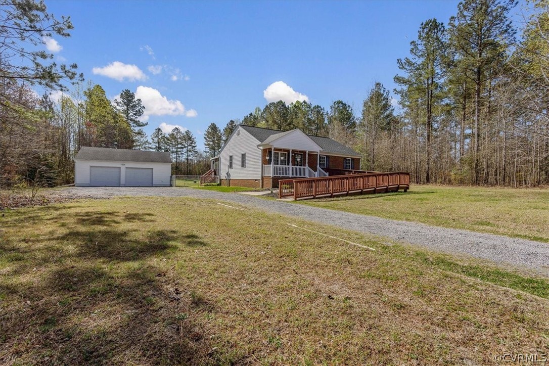 a view of a house with a big yard