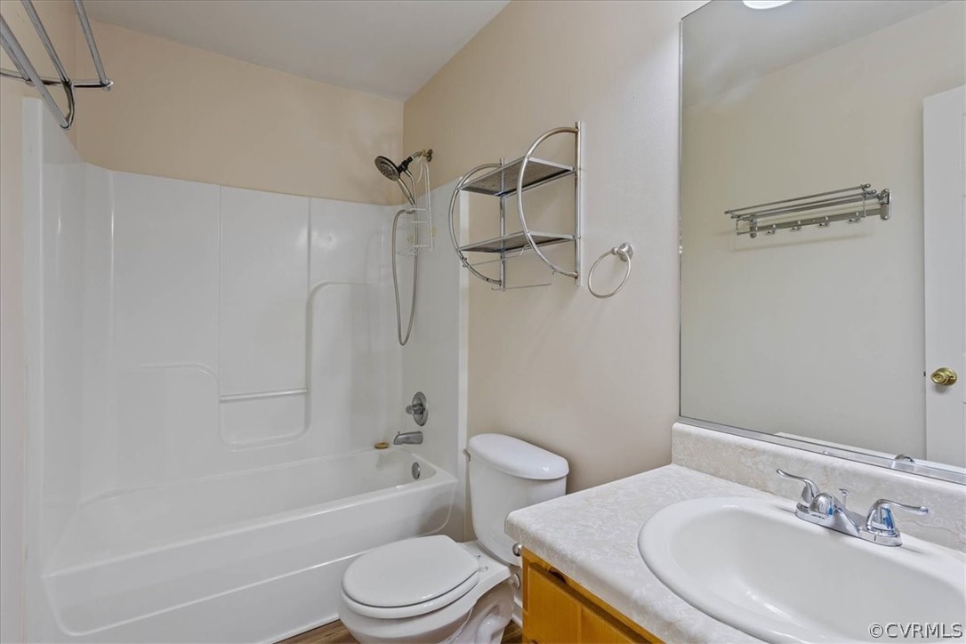 7231 Railroad Bed Road Carson, VA 23830 - Photo 14 of 42 a bathroom with a sink toilet and shower