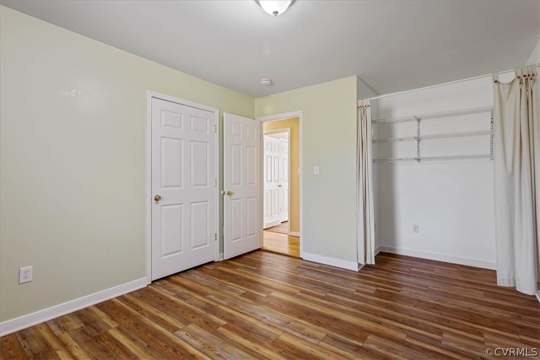 7231 Railroad Bed Road Carson, VA 23830 - Photo 19 of 42 a view of an empty room with wooden floor