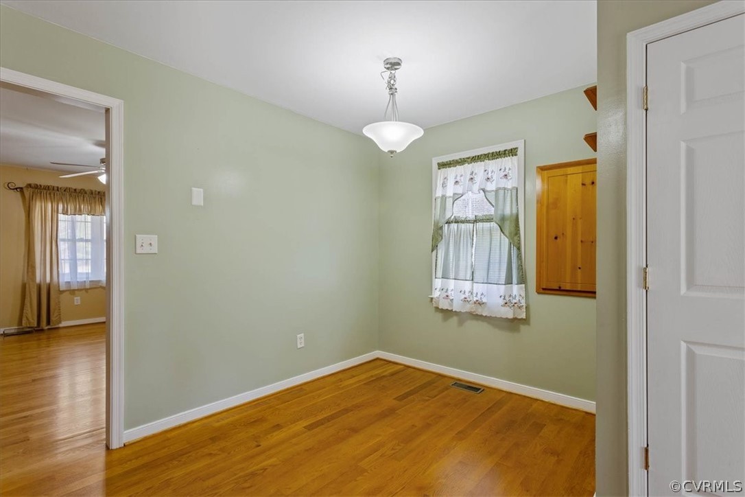 7231 Railroad Bed Road Carson, VA 23830 - Photo 8 of 42 a view of empty room with window and wooden floor