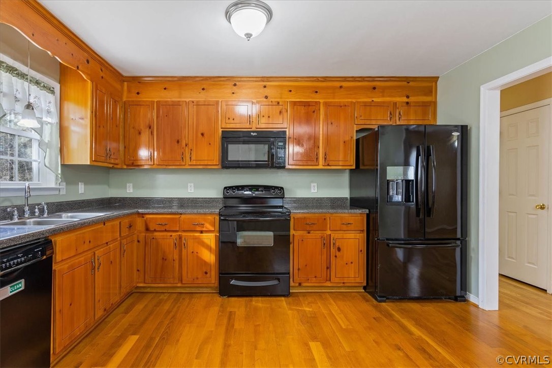 7231 Railroad Bed Road Carson, VA 23830 - Photo 10 of 42 a kitchen with stainless steel appliances granite countertop a refrigerator and a sink