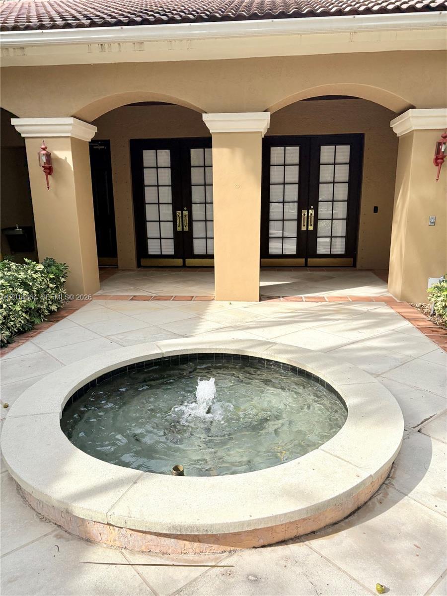 8030 North Nob Hill Road, Unit 105 Tamarac, FL 33321 - Photo 21 of 22 a view of fireplace