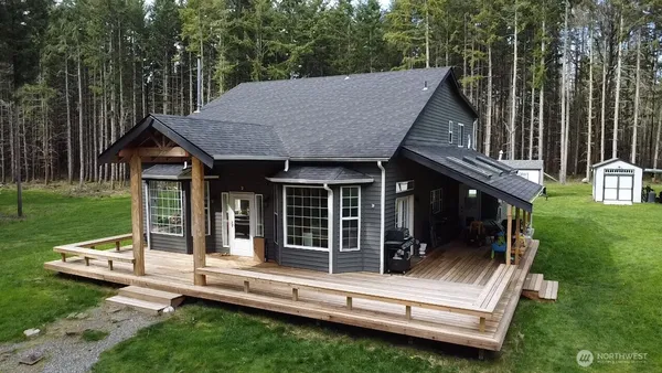 a view of house and outdoor space with swimming pool