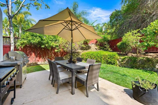a view of an outdoor sitting area with golf course