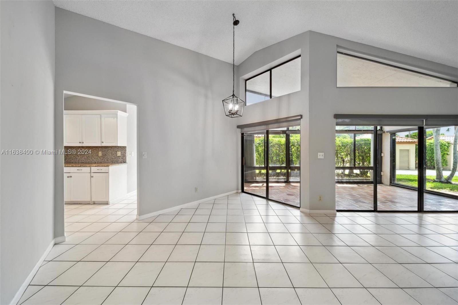 23366 Water Circle Boca Raton, FL 33486 - Photo 7 of 43 a view of an entryway and livingroom