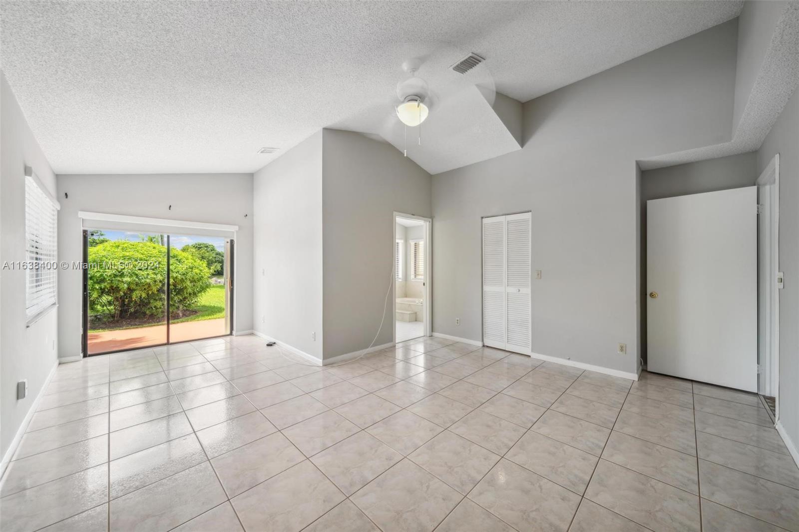 23366 Water Circle Boca Raton, FL 33486 - Photo 8 of 43 a view of an empty room with a window