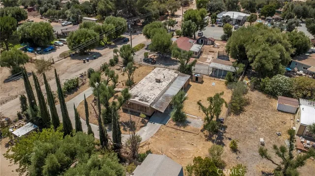 an aerial view of residential house with parking space