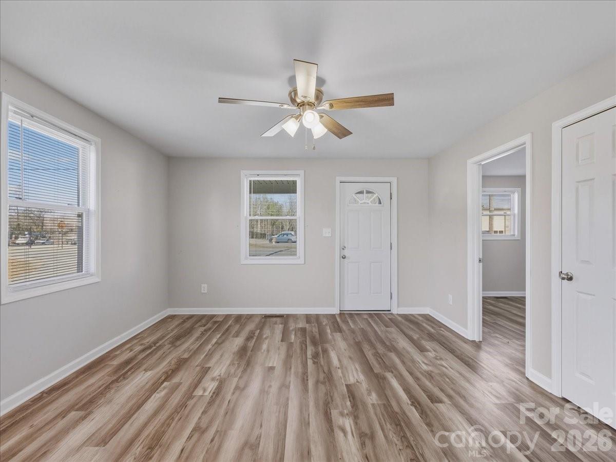 200 Blacksnake Road Stanley, NC 28164 - Photo 5 of 24 wooden floor in an empty room with a window