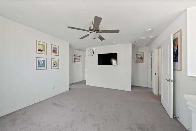 a view of a livingroom with a flat screen tv