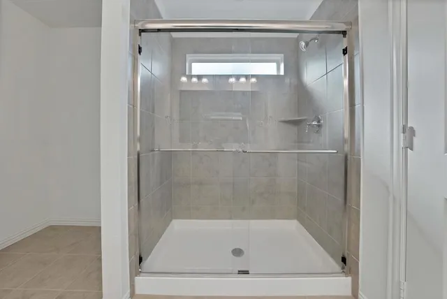 a bathroom with a bath tub