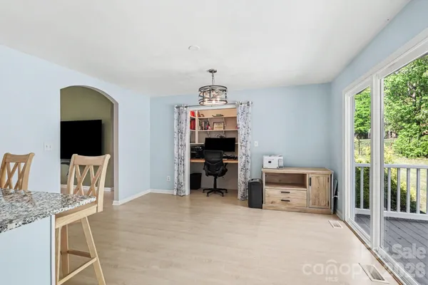 a view of a livingroom with furniture and window
