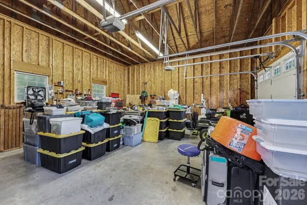 a room with lots of furniture and clutter