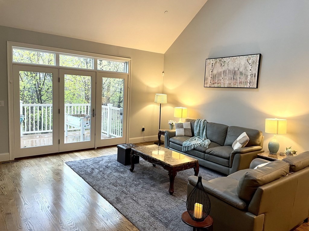 8 Graystone Circle Winchester, MA 01890 - Photo 13 of 41 a living room with furniture and a large window