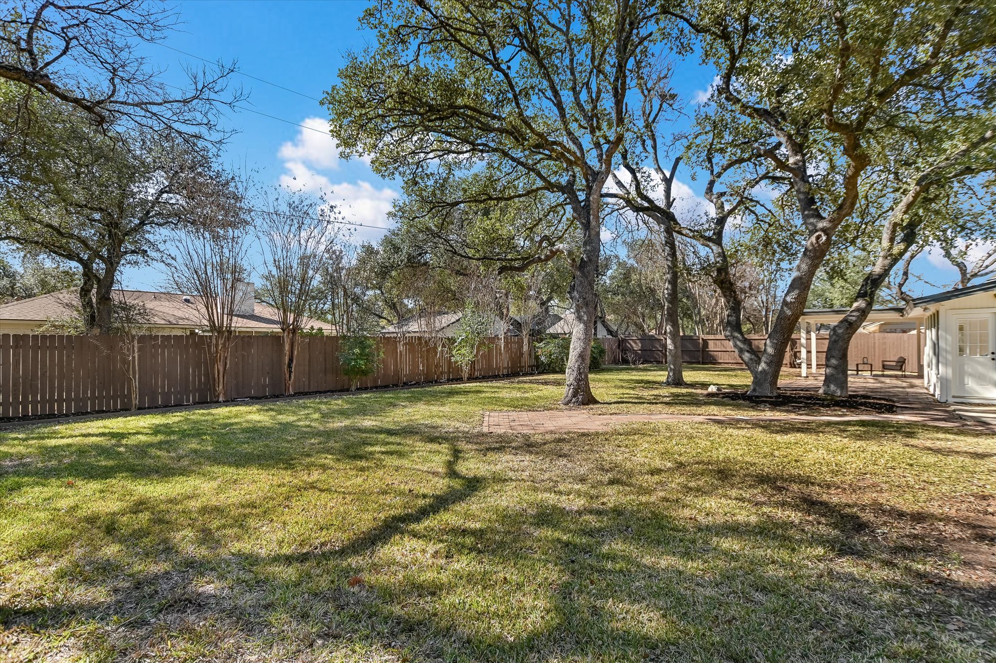 9905 Richelieu Road Austin, TX 78750 - Photo 21 of 32 View of fenced backyard. Room for a pool.