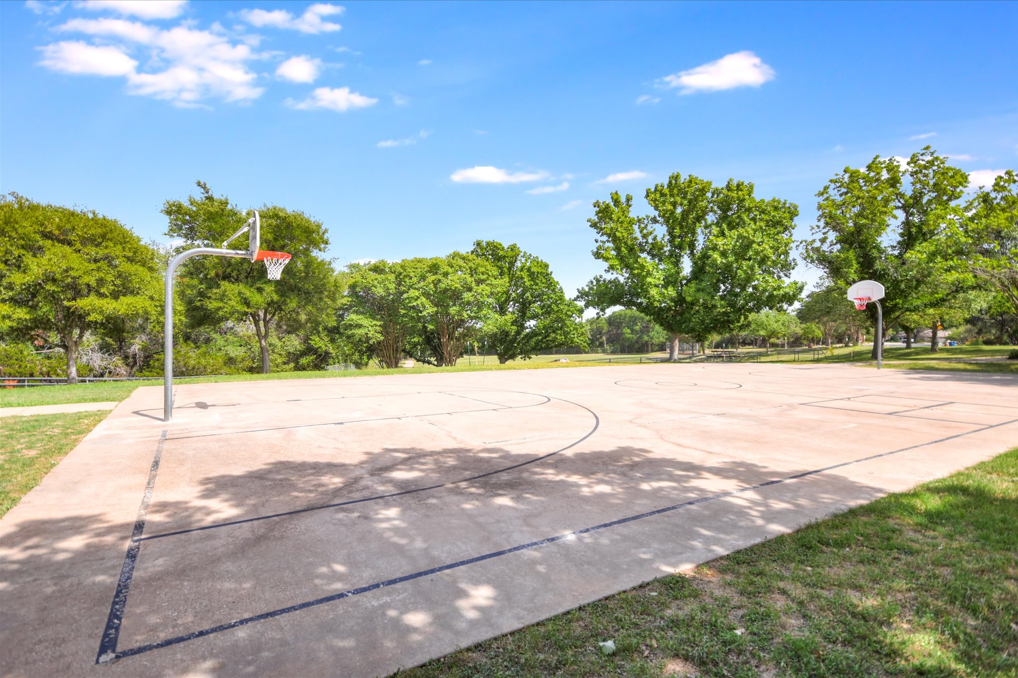 9905 Richelieu Road Austin, TX 78750 - Photo 30 of 32 View of sport court with community public basketball court
