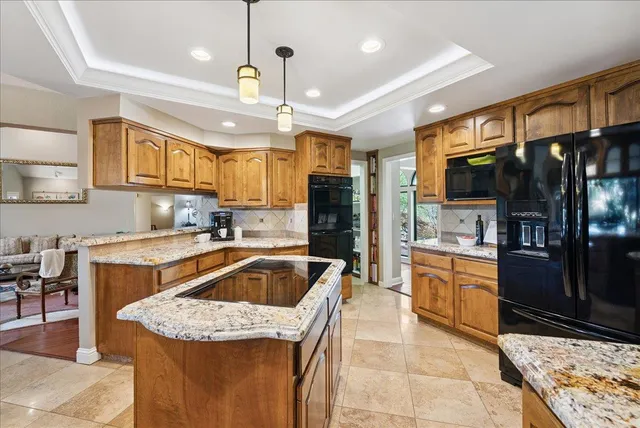 a large bathroom with a sink a large mirror and a bathtub