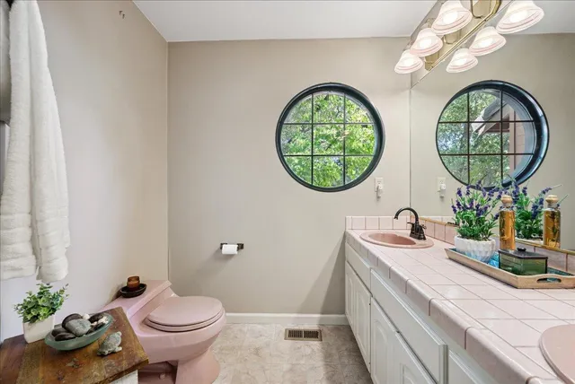a view of a chairs and tables in the patio