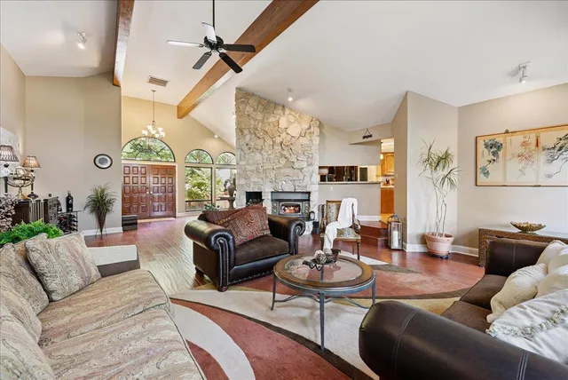 a large bathroom with a sink and a large mirror