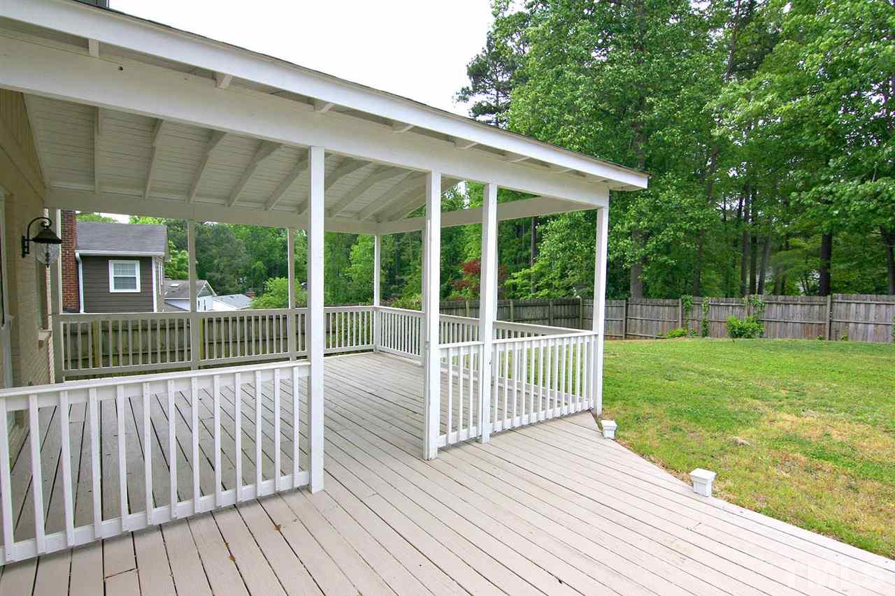 7801 Audubon Drive Raleigh, NC 27615 - Photo 25 of 25 a view of a house with a deck