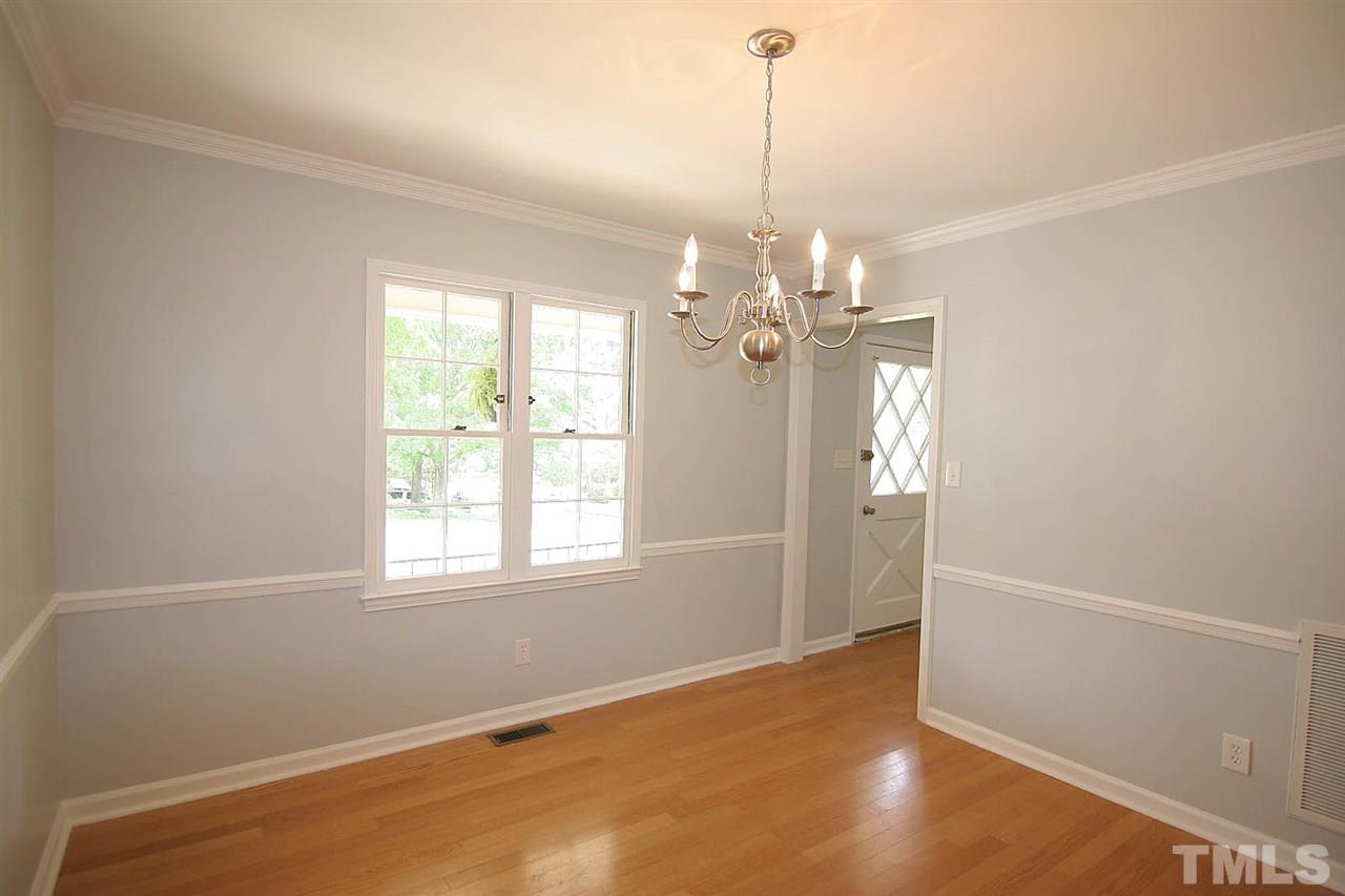 7801 Audubon Drive Raleigh, NC 27615 - Photo 6 of 25 a view of livingroom with window